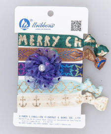 El pelo elástico del diseño de la Navidad congriega las diversas cinturas elásticas de los colores impresas