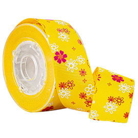 Cajas de torta amarilla que envuelven la cinta grosgrain impresa flor